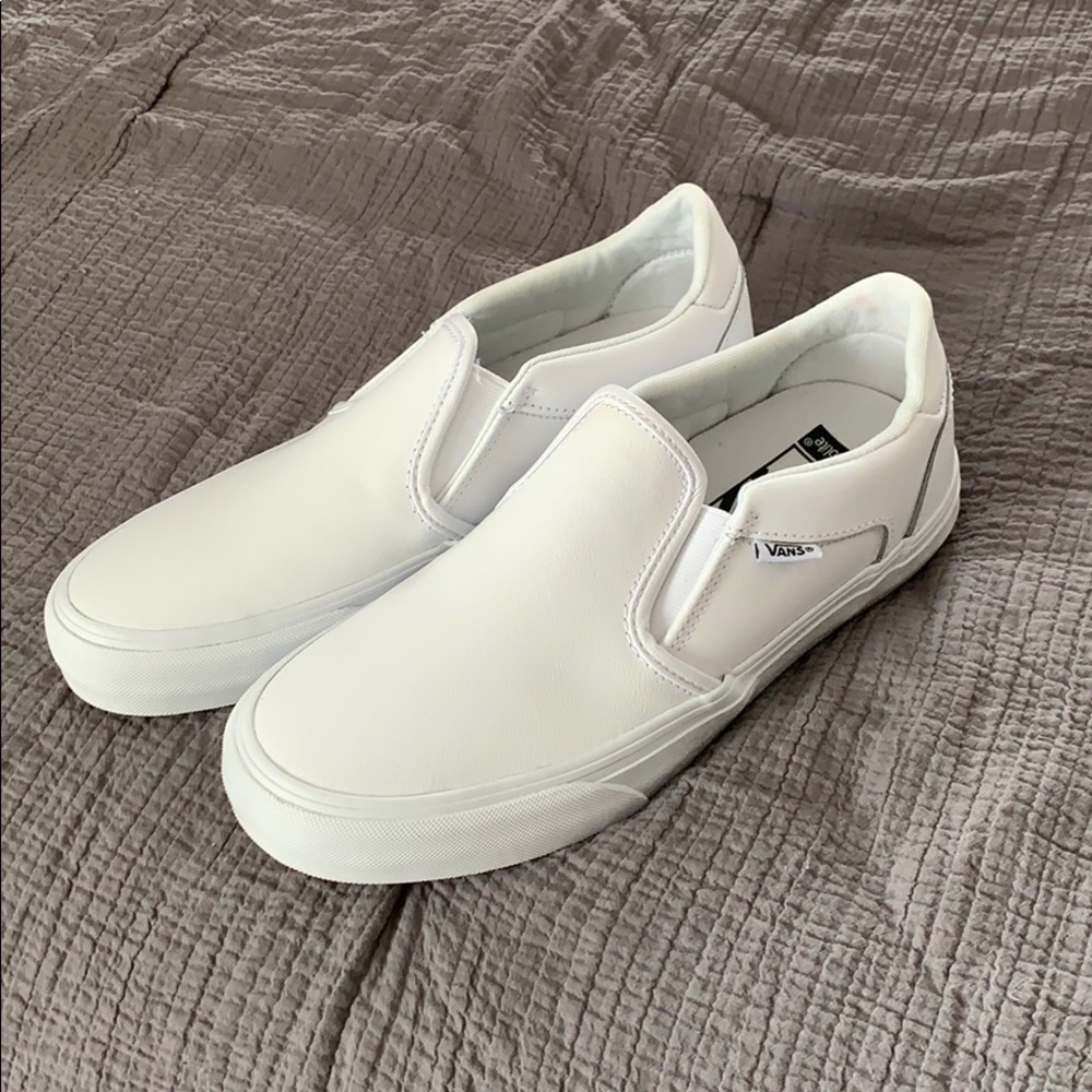 Brand new white slip-on Vans